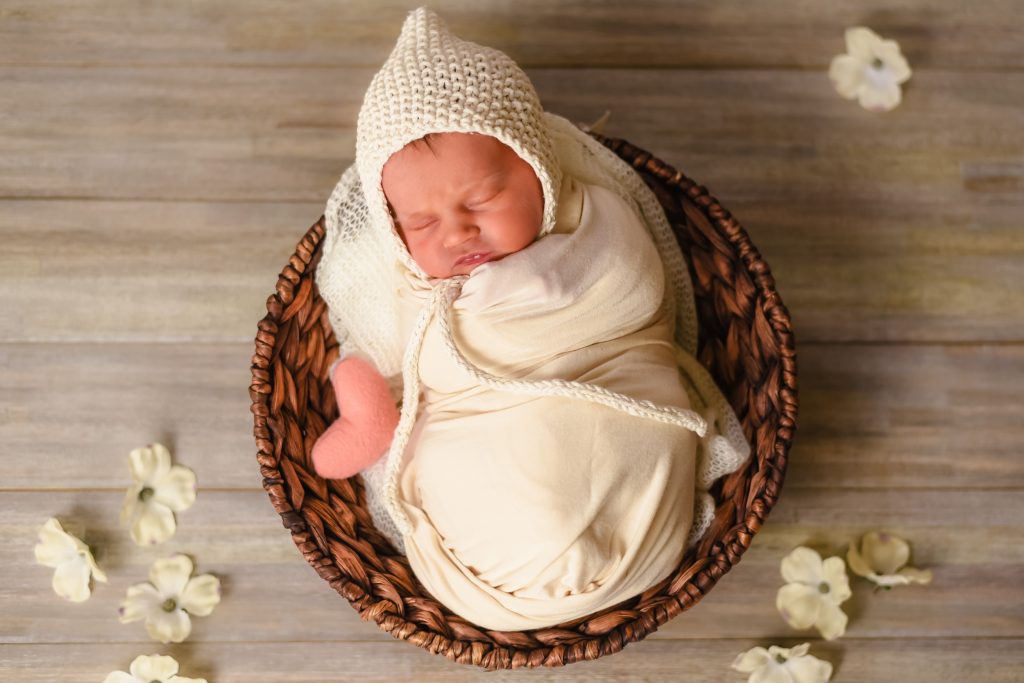 newborn baby in white