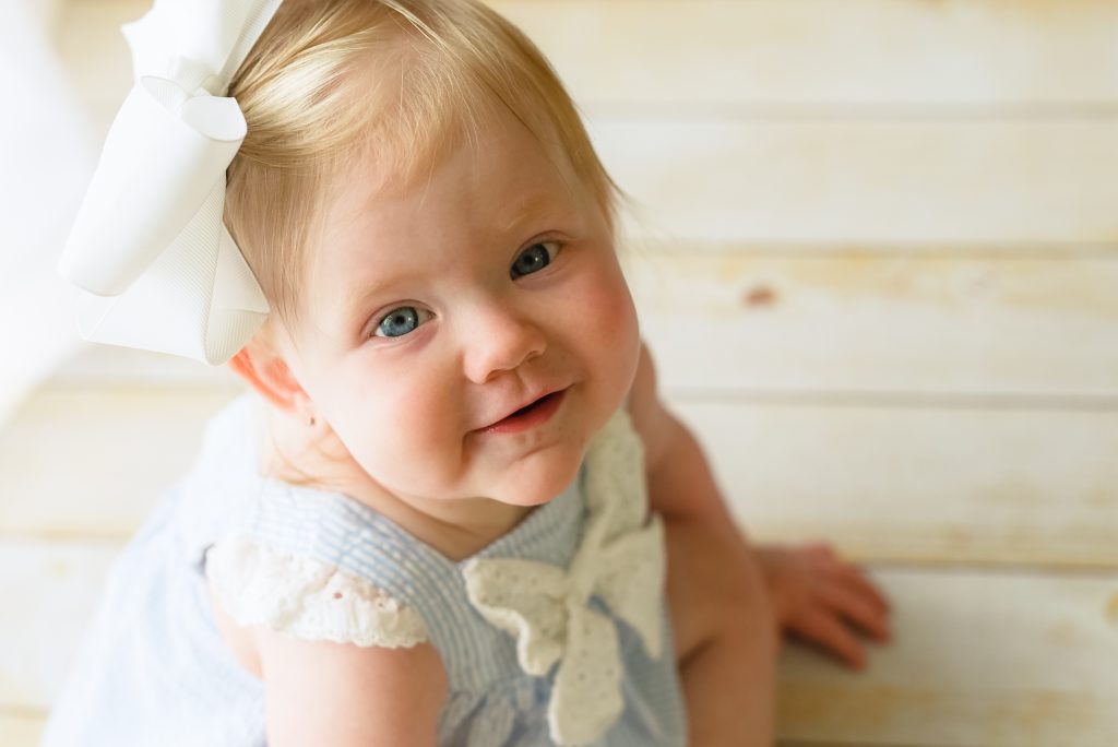 Baby girl looking up